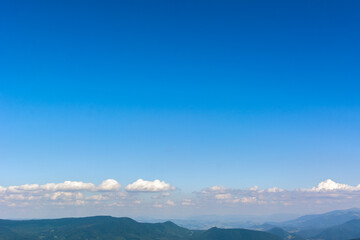 Traveling by the Carpathians. Polonyna Runa, Gostra, and other peaks. Spring, Summer and Autumn rest in the Carpathians. Green, Blue colors. Forest and meadows.