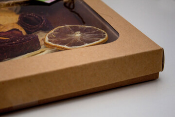 Box with dried fruits on a white background, healthy food