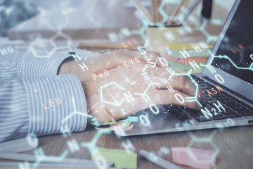 Science formula hologram with man working on computer on background. Education concept. Double...