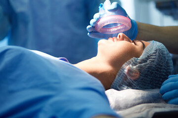 Man surgeon at work in operating room