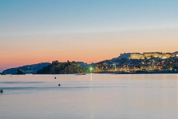 Views of Almuñecar with its Arabian castle and its rocks at nightfall. Long exposure.