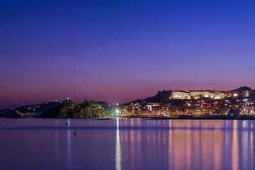 Views of Almuñecar with its Arabian castle and its rocks at nightfall. Long exposure.