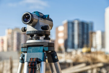 Surveyor equipment GPS system or theodolite outdoors at highway construction site.Measuring...