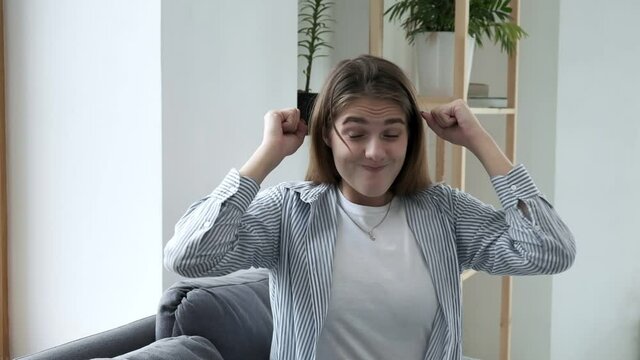 Mindblown reaction of happy millennial girl expressing astonishment, thrilling excitement. young caucasian woman in shocking situation, gesture of mind blown. She never expected this and surprised