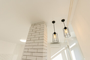 Beautiful built-in lamps in the stretch ceiling