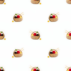 Diagonal rows of small baskets with yarn and knitting sticks on empty white background. Vintage hobby spring and eco concept. Seamless pattern, photographic collage,
