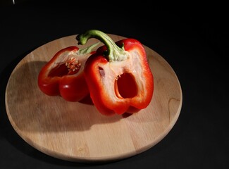 Red pepper on a wooden board