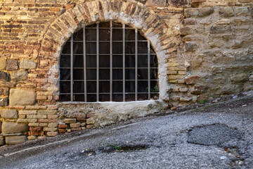 Fototapeta premium window in a old castle. Toscany, Italy 