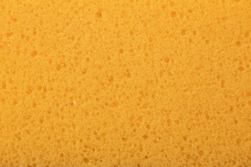 Yellow sponge background, close-up sponge.