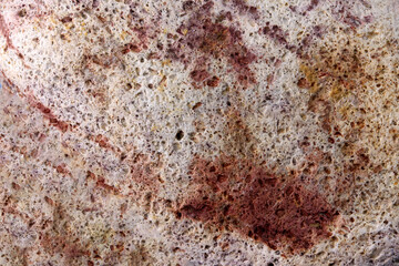 a piece of stone on blue background