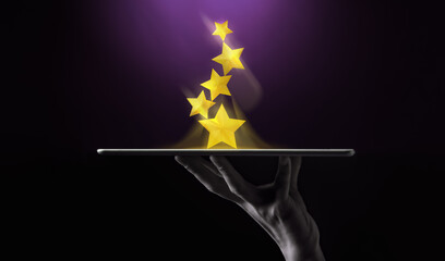 Success in Business or Personal Talent Concept. Hand Raise Up a Digital tablet with Golden Five...