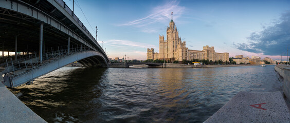 Sunset view of Kotelnicheskaya Embankment Building and Moscow river in Moscow, Russia.