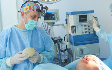 Man surgeon at work in operating room