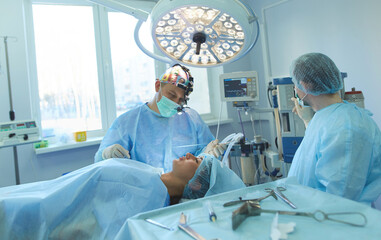 Man surgeon at work in operating room