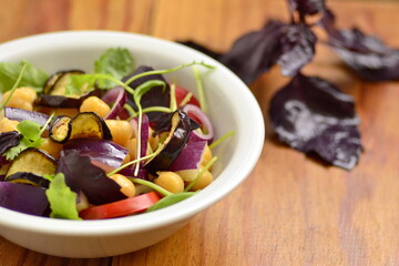 Eggplant Salad with Chickpeas and Fresh Vegetables,   copy space