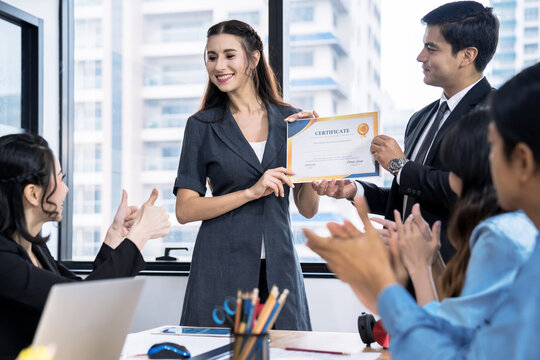 Business executives congratulate employees on their excellent work, Certificate of Excellence or a Certificate for Success in Work, Business people teamwork.