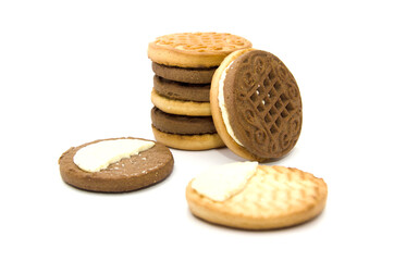 Sandwich cookies on a white background. Close-up. Cookie chunks and crumbs