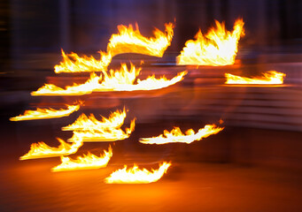 Flame of fire in motion at night.