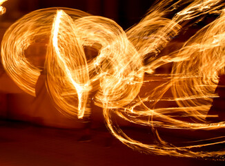 Flame of fire in motion at night.