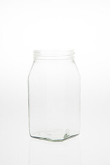 Isolated glass bottle on white background without cap.