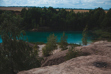 coal quarry blue lakes sand quarry landscape sand and blue sky blue water
