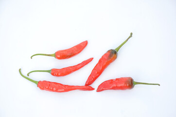 bunch the red ripe chilly isolated on white background.