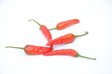 bunch the red ripe chilly isolated on white background.