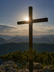 summit cross at sunset mount Peilstein Austria