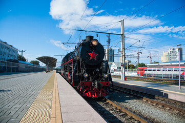 Vintage black steam locomotive. The train arrived at the station