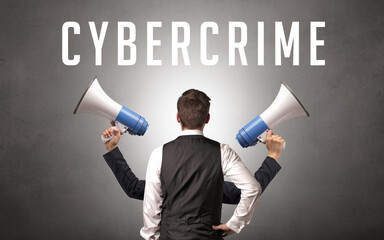 Rear view of a businessman with CYBERCRIME inscription, cyber security concept