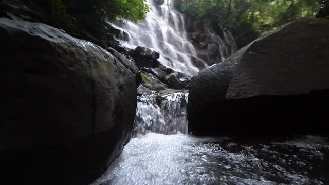 Kanto Lampo Waterfall Bali Indonesia Dolly Reveal Slow Motion.