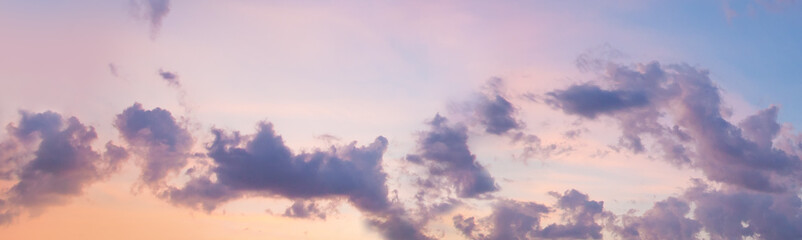 Panoramic sunset sky. Clouds on sky background