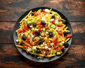 Loaded potato Vegan Fries with tomato, cucumber, olives and feta cheese
