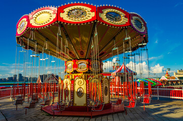 Carousel for children in the Park in summer.