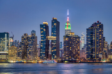 Fototapeta na wymiar Manhattan Skyline with Empire State Building at night, New York City, USA