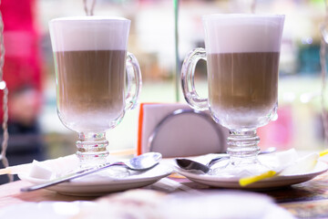 Two large cups with coffee latte
