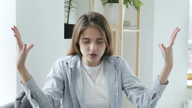 Mind blown reaction of millennial girl expressing her shock of something unbelievable. young caucasian woman express her feelings. excited pretty girl showing gesture of brain explosion
