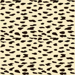 Pattern - black abstract spots - light yellow background - vector. Leopard fabric