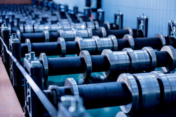 Metal sheet forming machine at the modern metalwork factory.