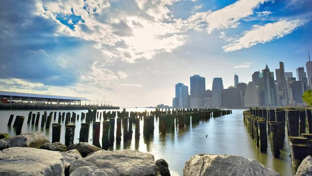 A time lapse of the pylons at Brooklyn Bridge Park on a sunny day.
