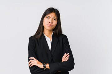 Young asian business woman unhappy looking in camera with sarcastic expression.