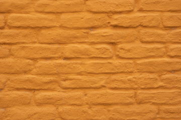 ocher and orange colors brick wall texture