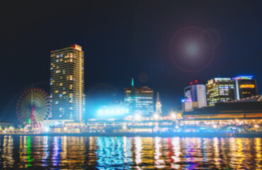 Fototapeta na wymiar Japan Modern Technology Smart City illuminated for Futuristic Blurred for Background.