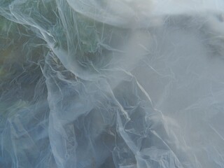 Delicate, airy cellophane surface.