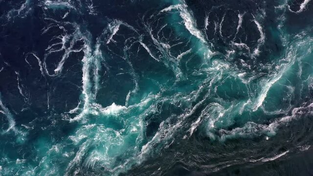 Waves of water of the river and the sea meet each other during high tide and low tide.