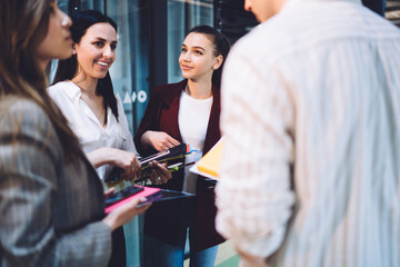 Happy employees having discussion on work related topics