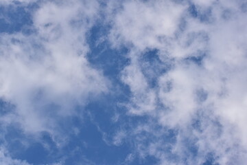 Blue sky with clouds background