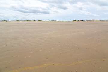Lighthouse seen from the beach on an island in the North Sea, Ameland, Holland
