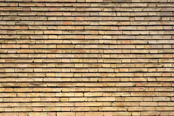 ocher and orange colors brick wall texture