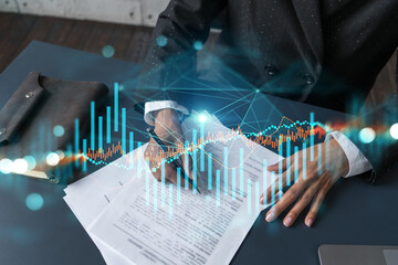 Woman signs agreement. Forex financil market chart and graph hologram. Double exposure . Brokerage concept.